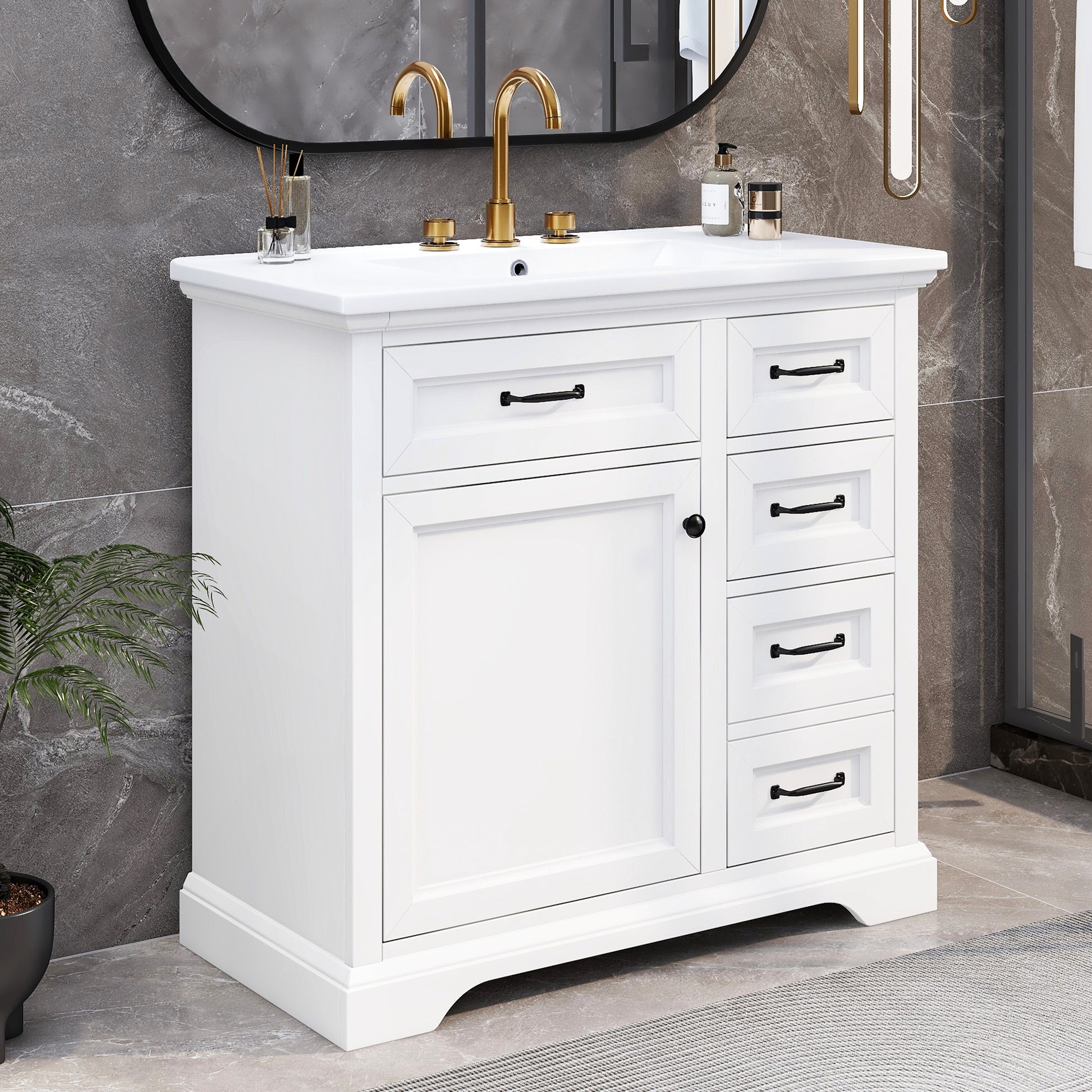 White shaker style bathroom vanity with gold faucet and black hardware