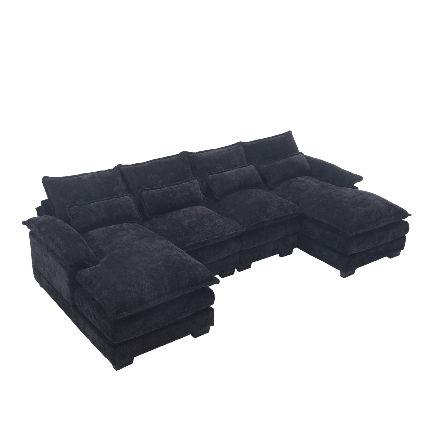 Plush dark grey sectional sofa with deep seats and multiple throw pillows