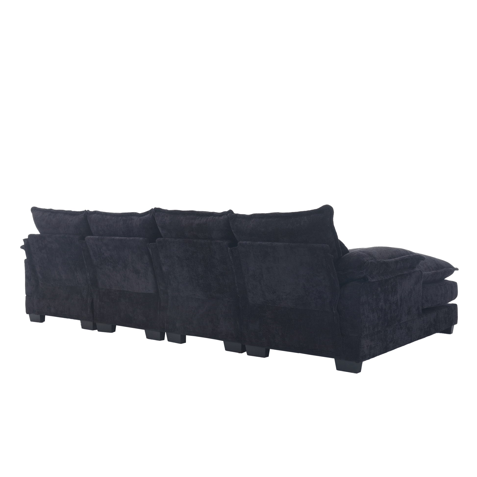 Deep charcoal velvet sectional sofa with plush back cushions and low profile legs