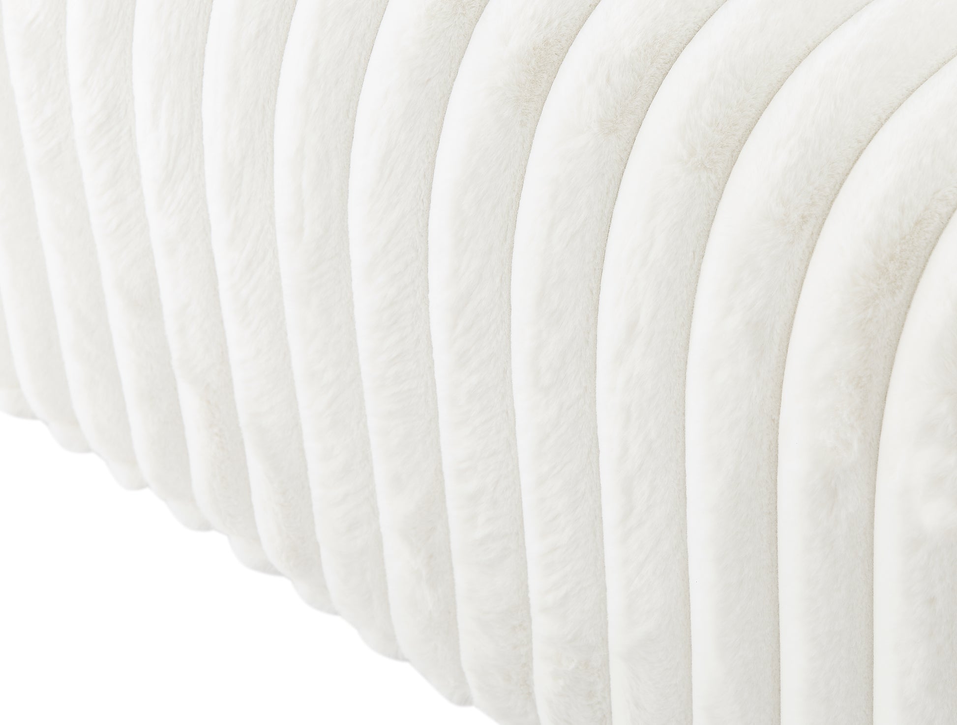 Cream faux fur throw with vertical ribbing texture