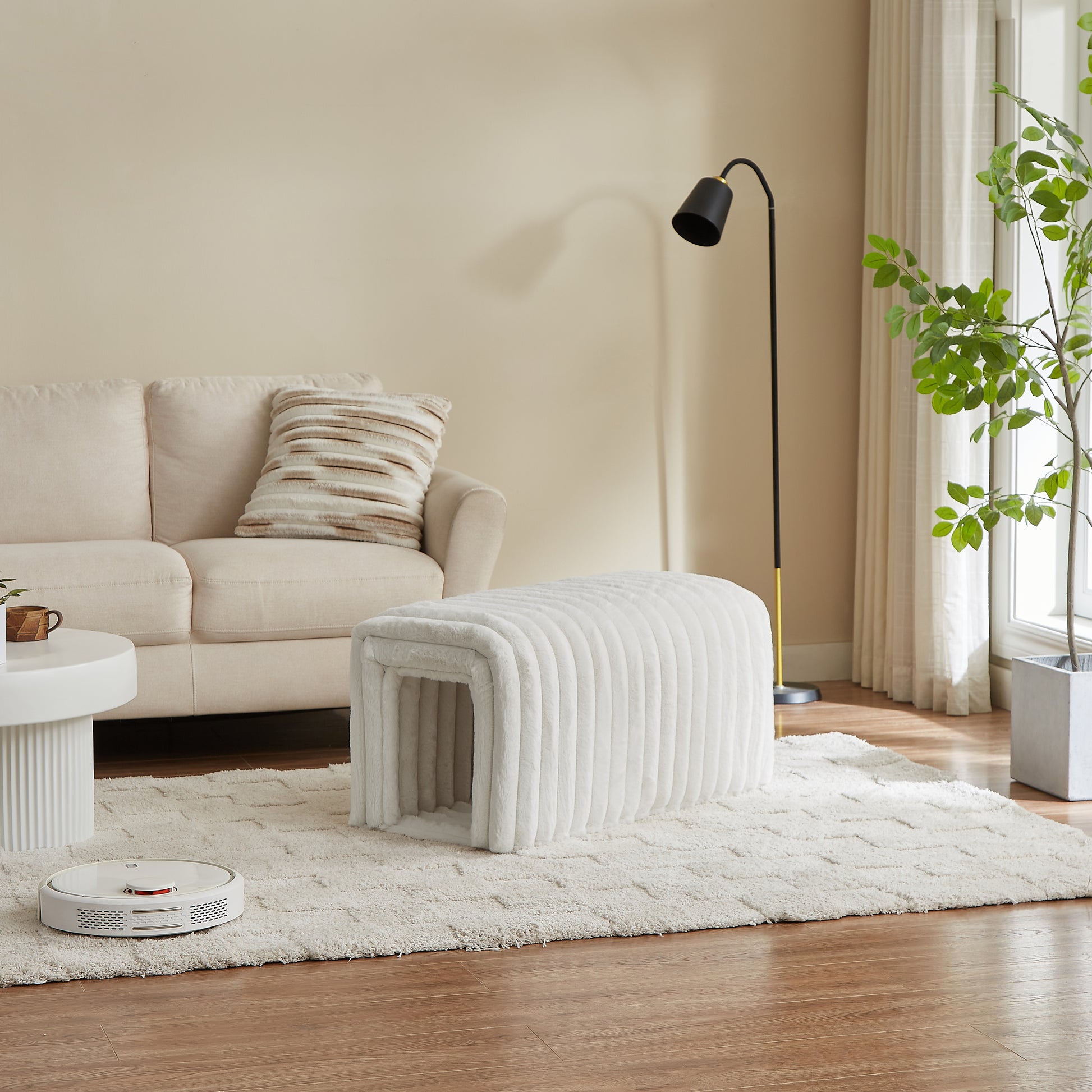 Plush white pet bed with arched entrance