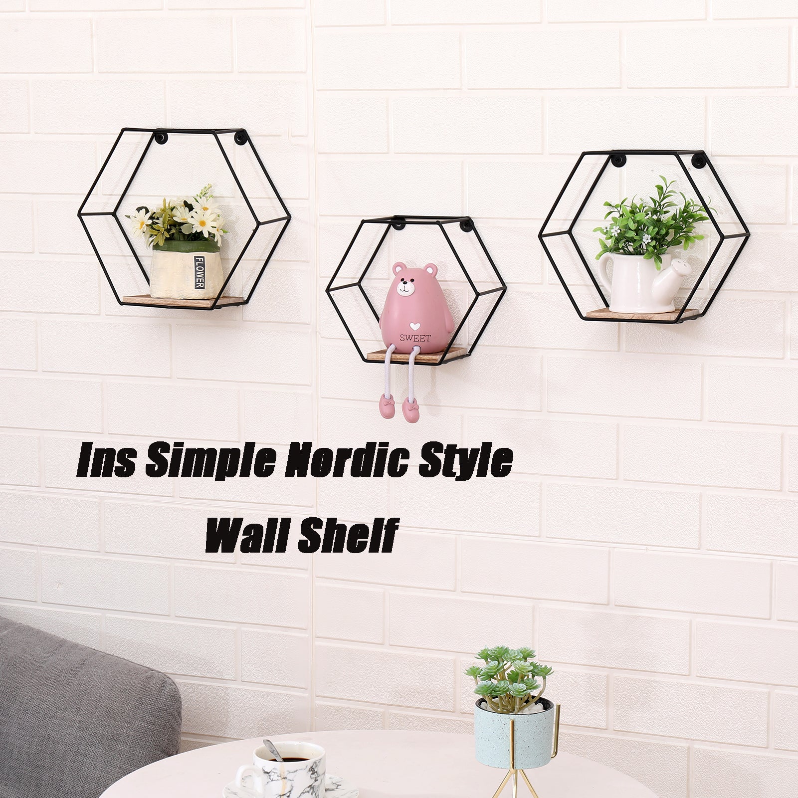 Black geometric wall shelf with wooden base and floral decor