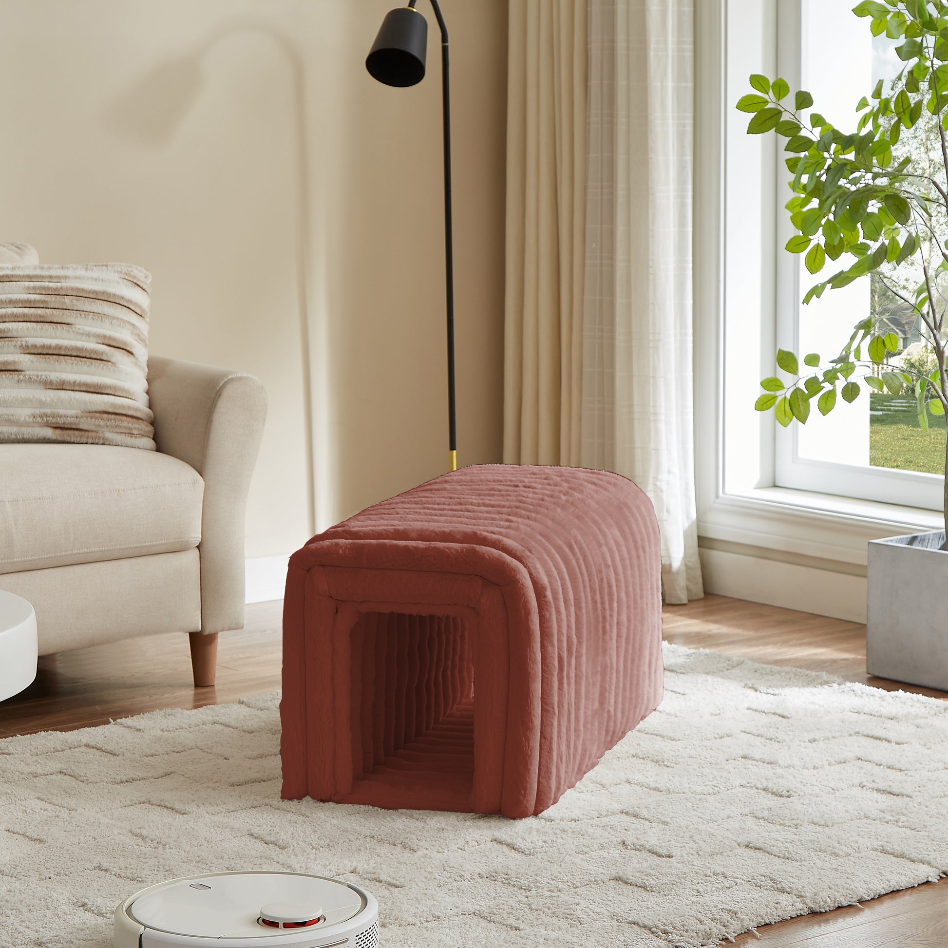 Rustcolored plush pet tunnel bed with ridged design for cozy hiding