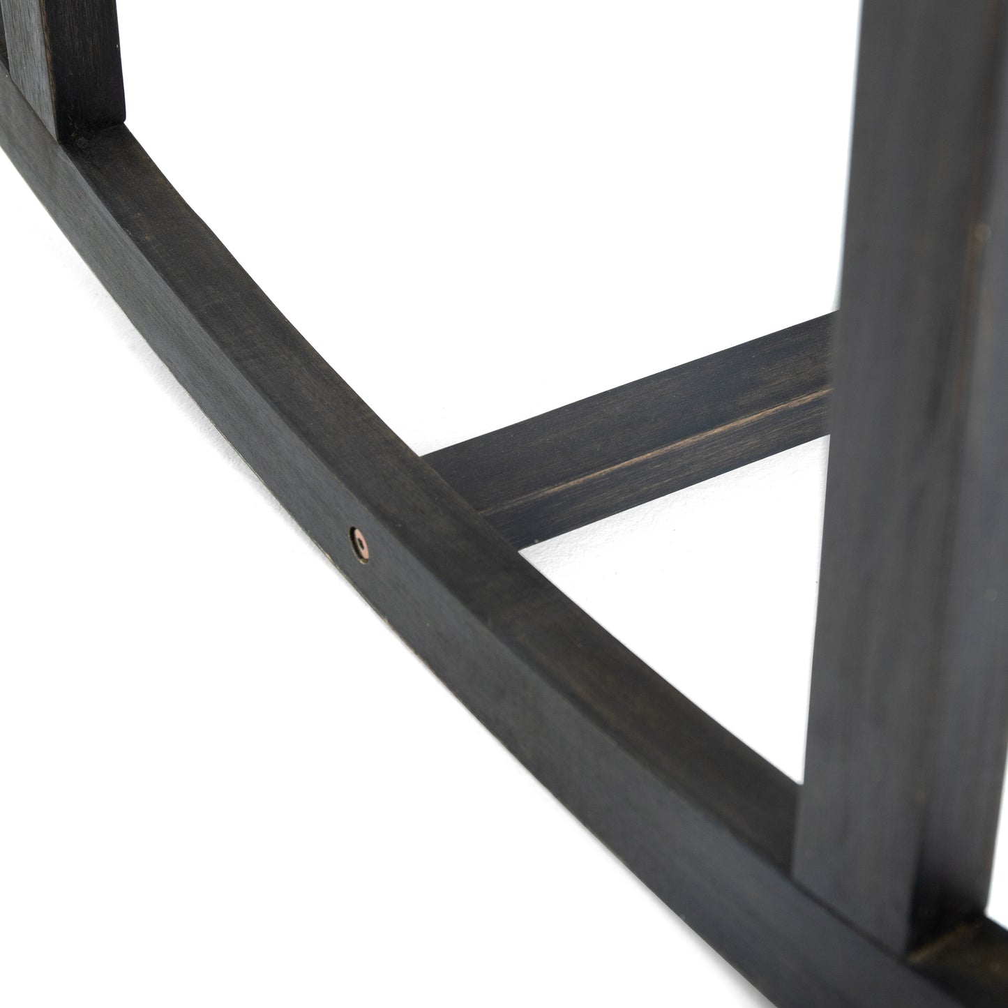 Close up of dark wood furniture frame corner join