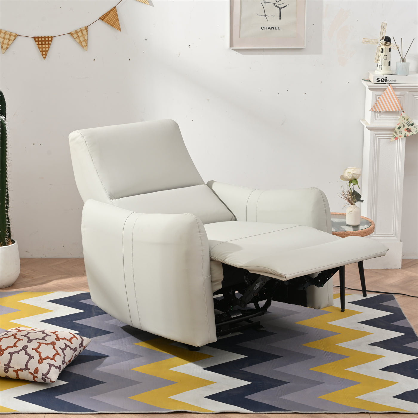 Cream leather power recliner with footrest extended