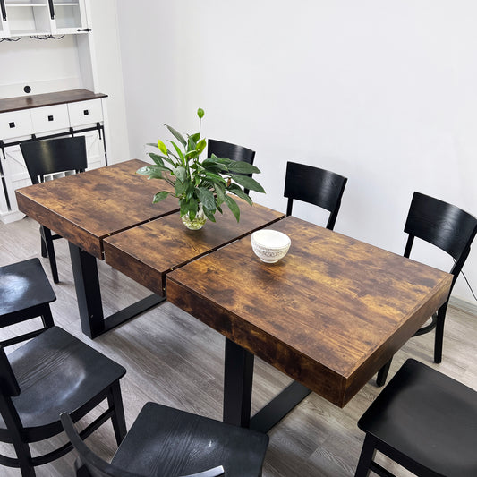 Rustic brown wood dining table with black metal legs
