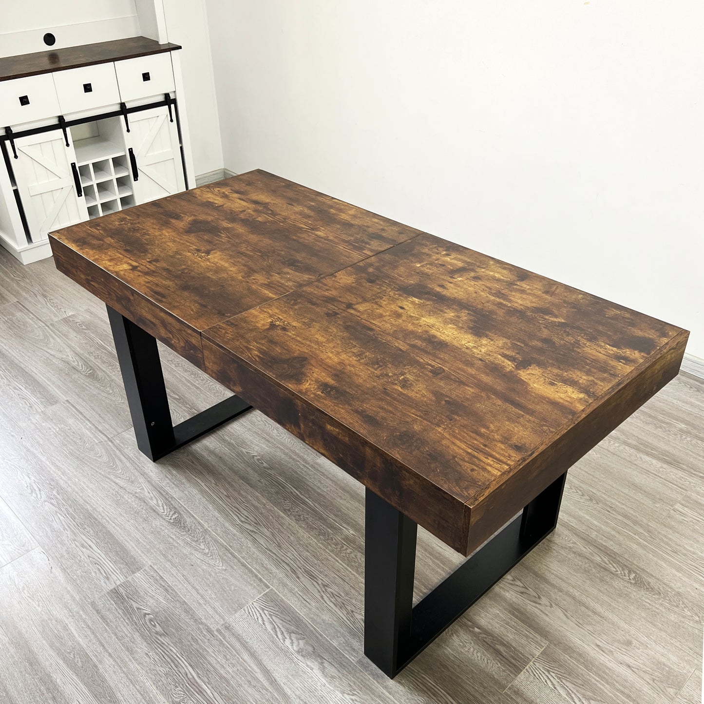 Rustic wooden dining table with matte black metal legs