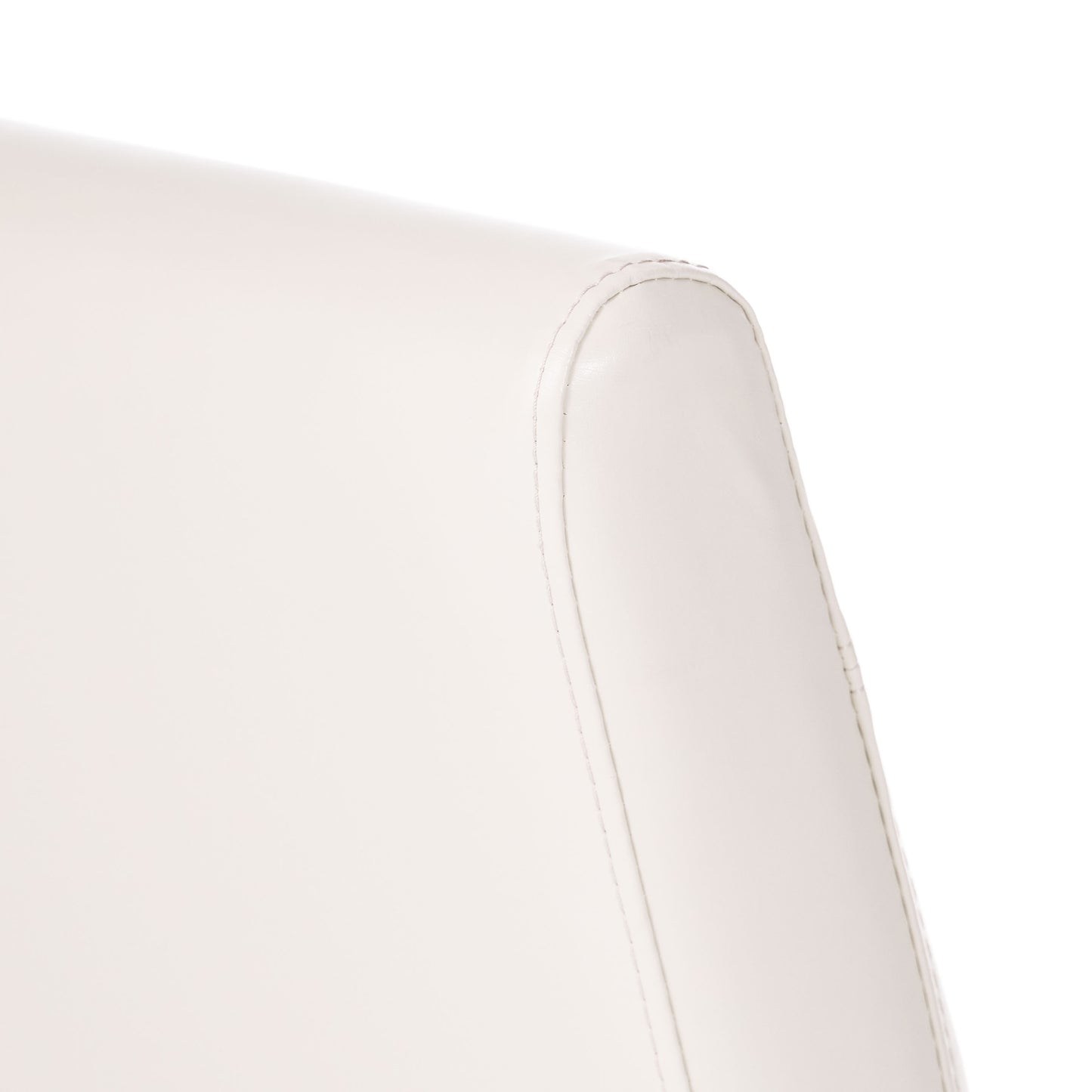 Close up of a white leather chair armrest with visible stitching details