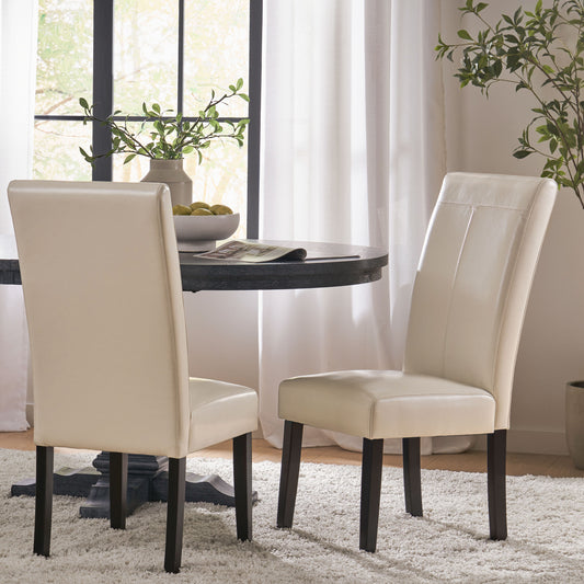 Cream upholstered dining chair with dark wood legs