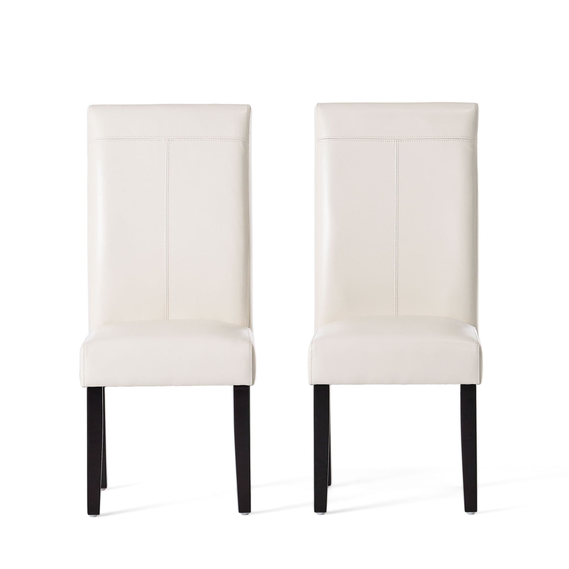 Two cream upholstered dining chairs with stitched details and dark wood legs