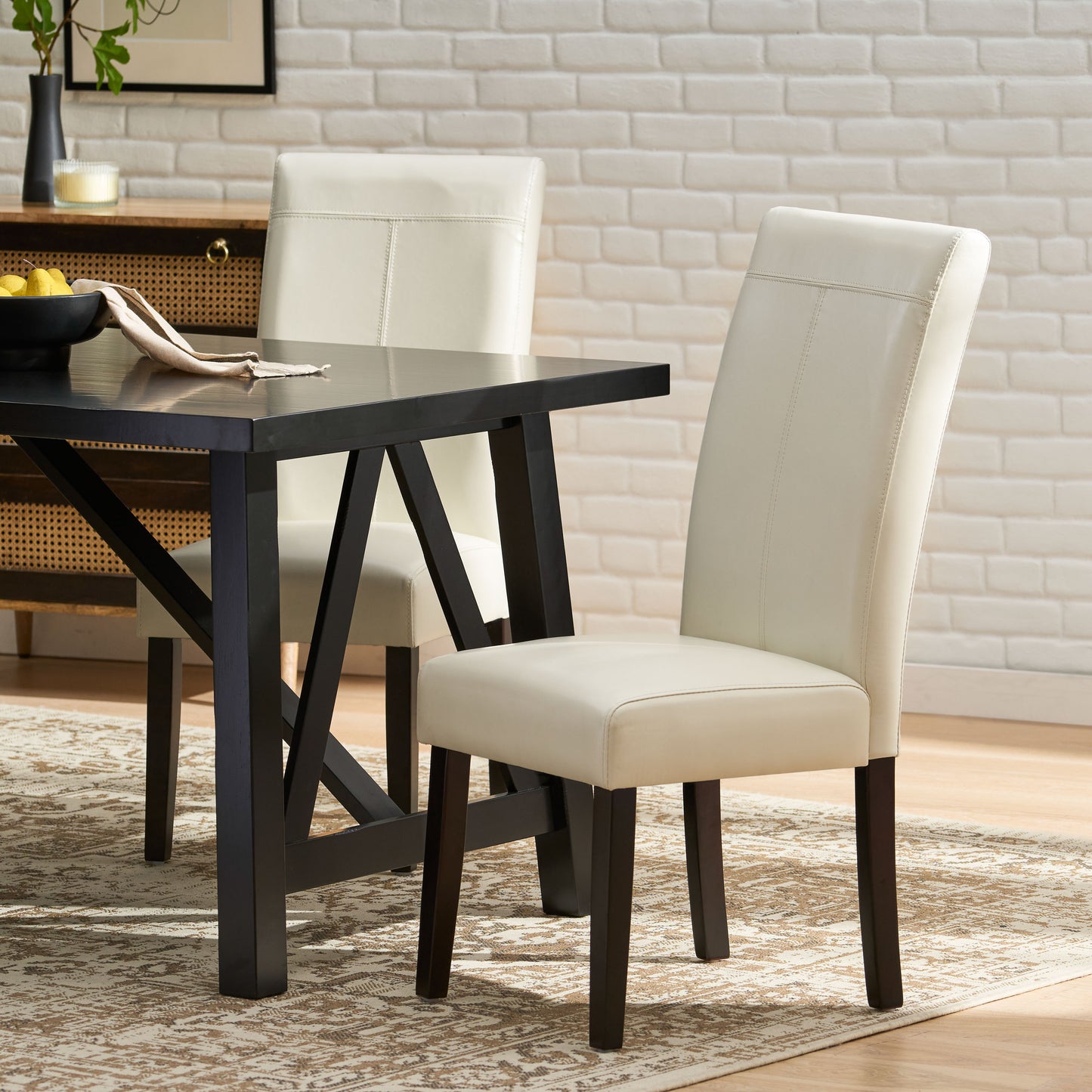 Cream faux leather dining chair with stitched details