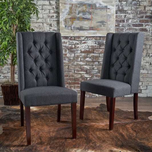 Dark gray upholstered dining chair with tufted back and mahogany legs