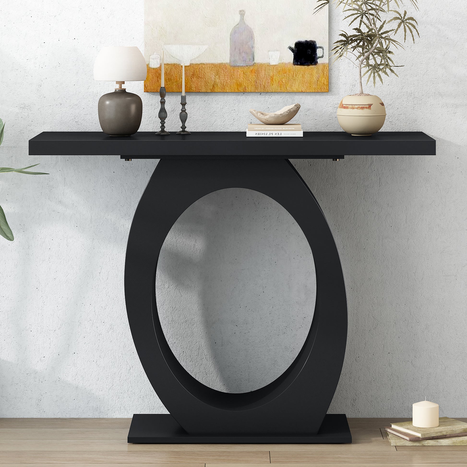 Modern black console table with unique oval cutout base