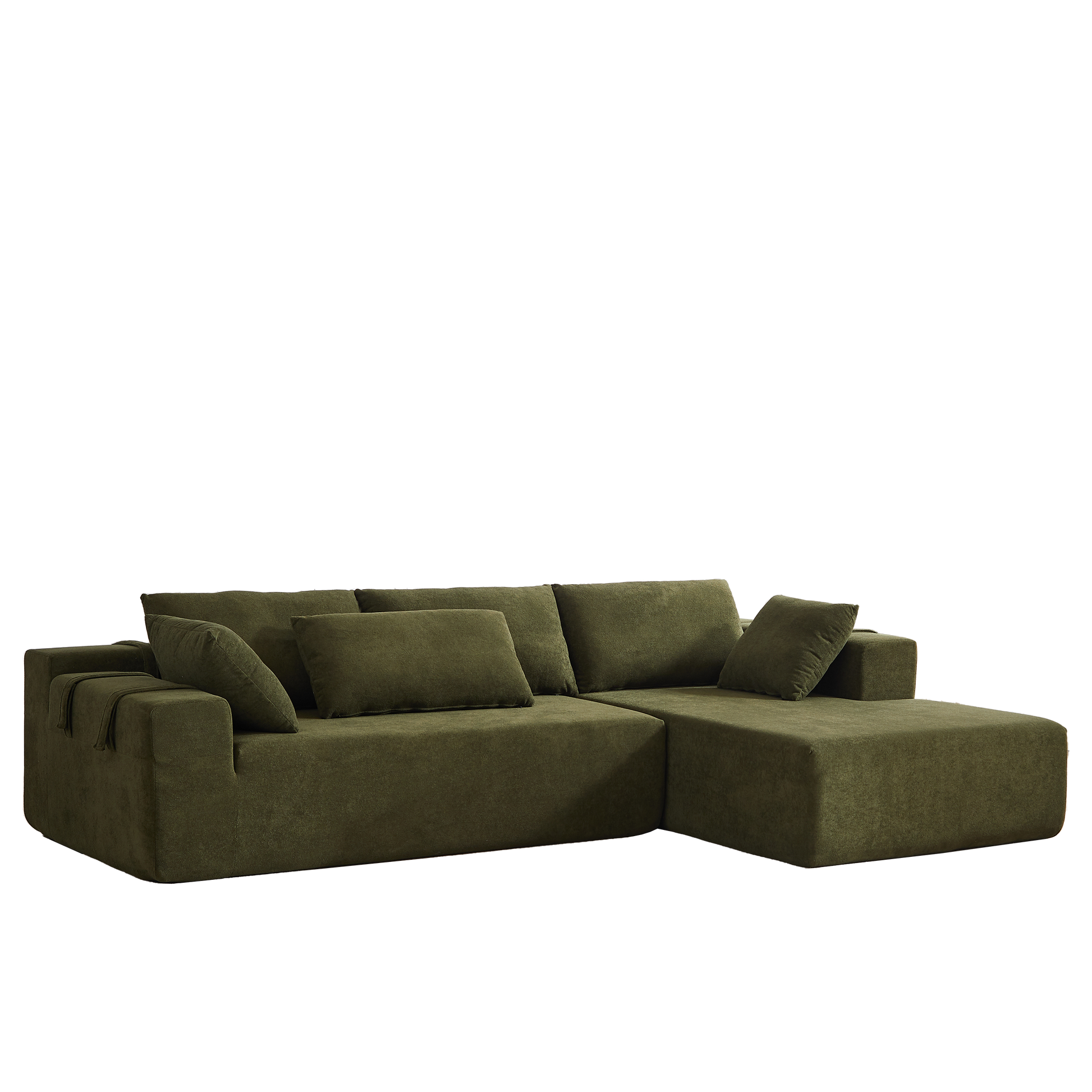 Deep green velvet sectional sofa with plush cushions and chaise lounge attachment perfect for modern living rooms