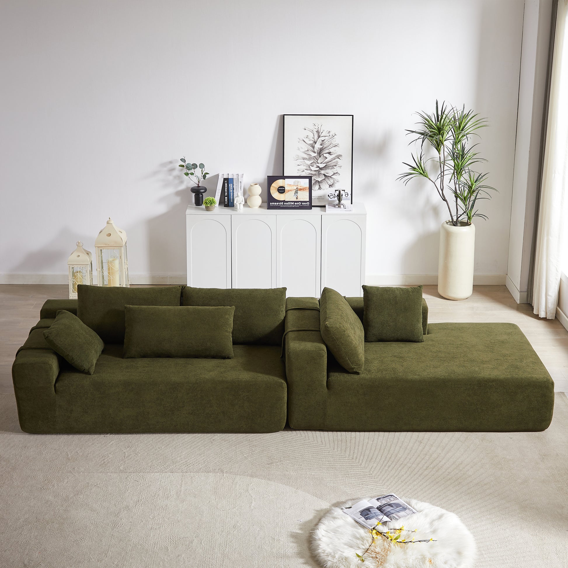 Deep green modular sectional sofa with plush cushions perfect for modern living rooms