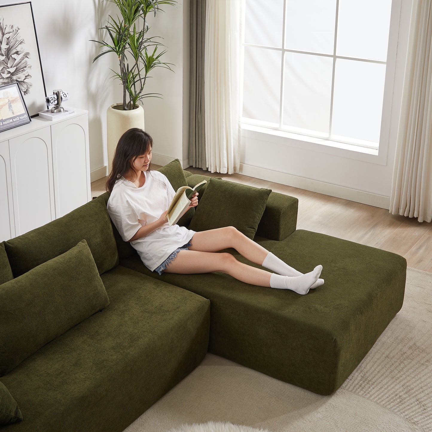 Sectional green sofa with textured fabric