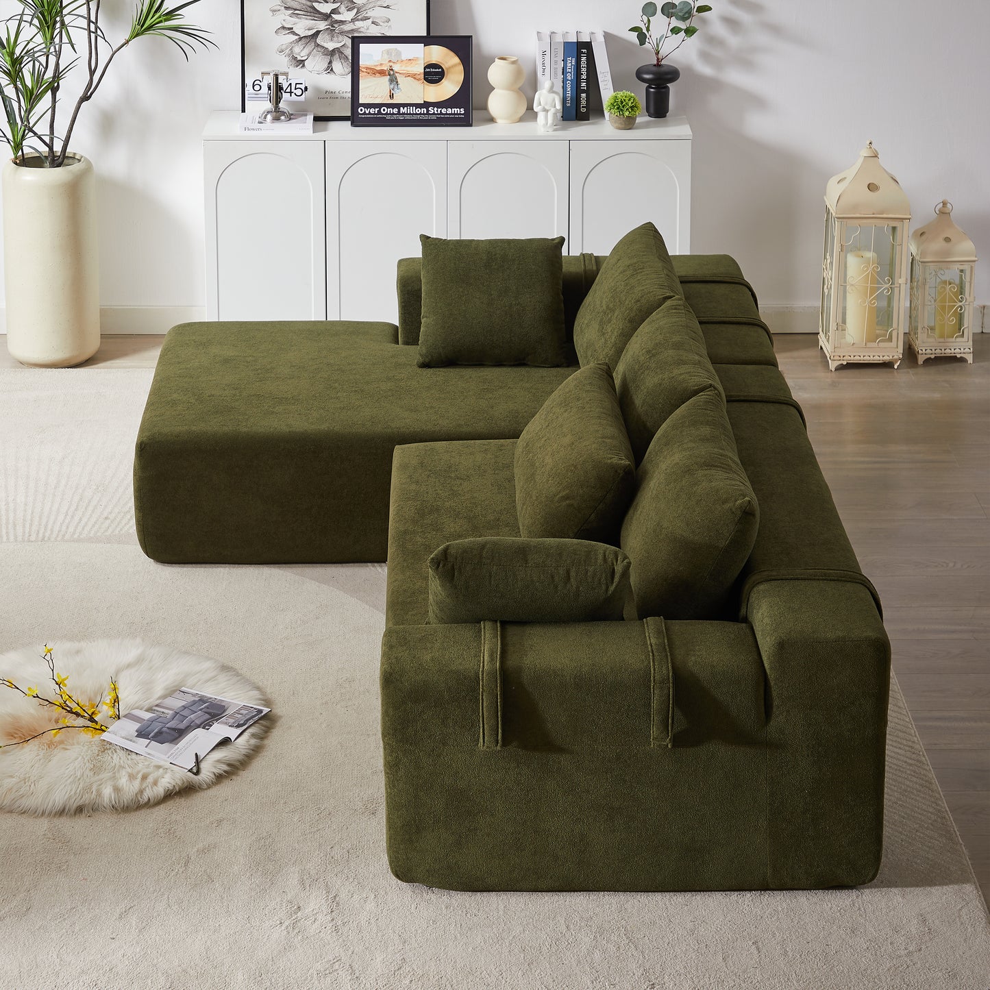 Plush olive green sectional sofa with plush cushions and a modular design