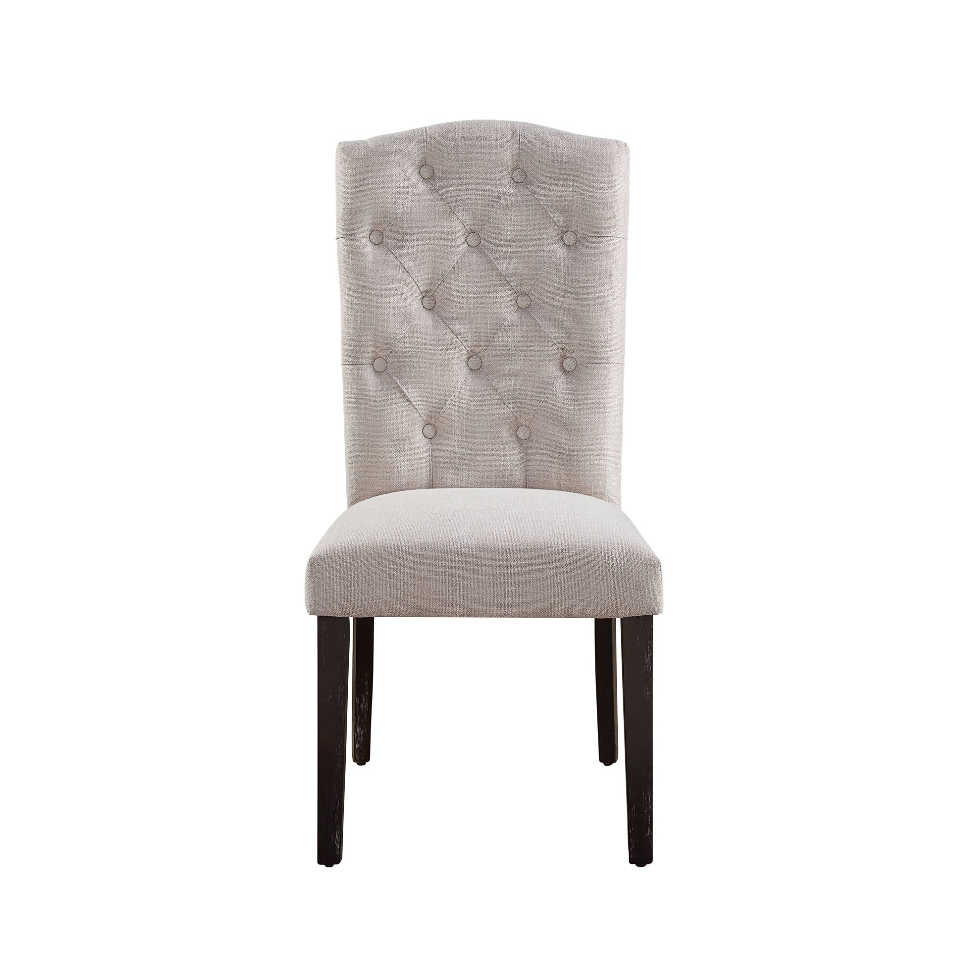 Beige upholstered dining chair with tufted back and dark wood legs
