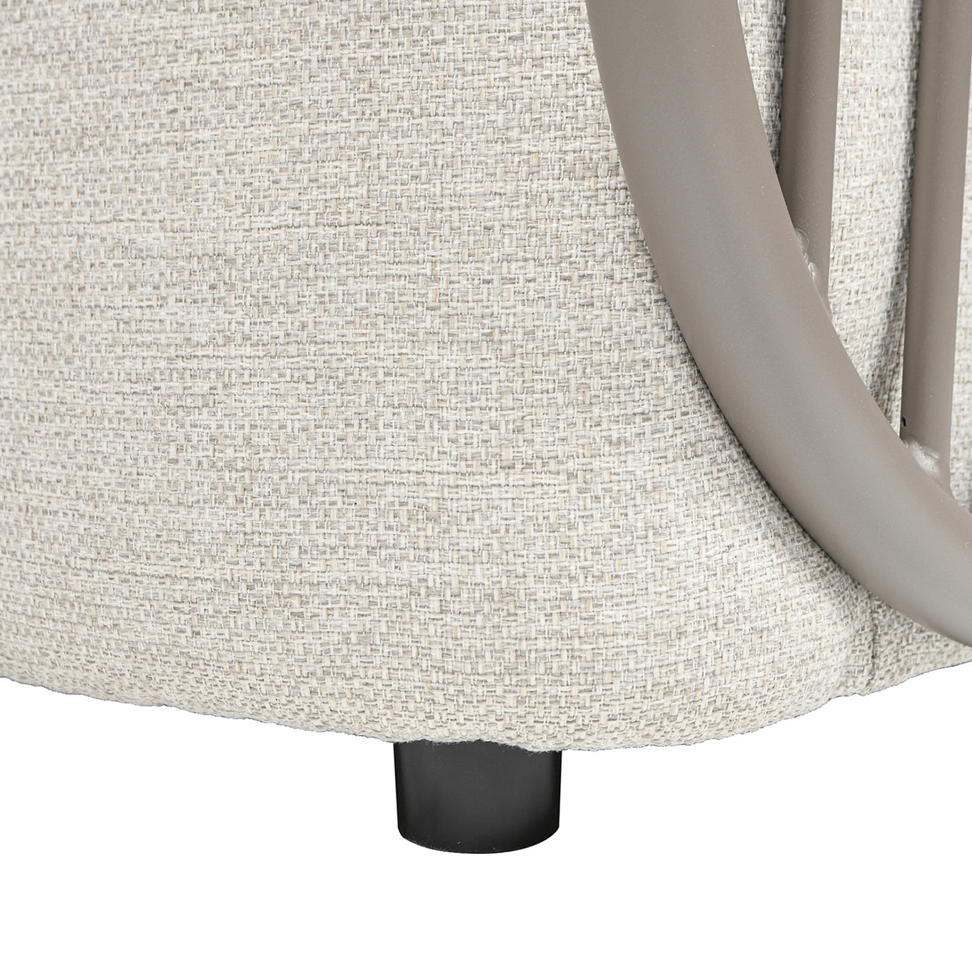 Beige textured fabric sofa detail with taupe metal frame