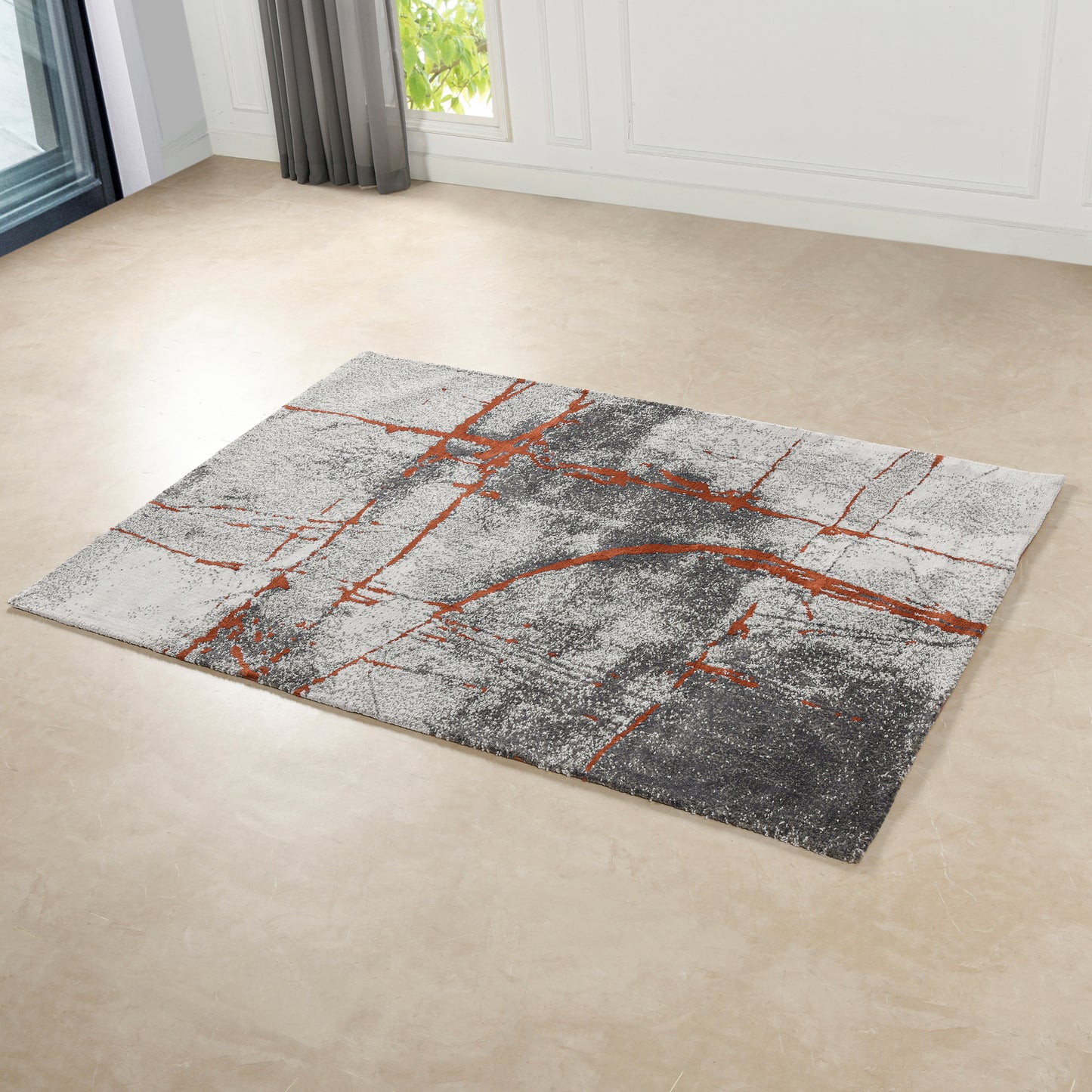 Modern abstract rug with grey white and bold orange linework design