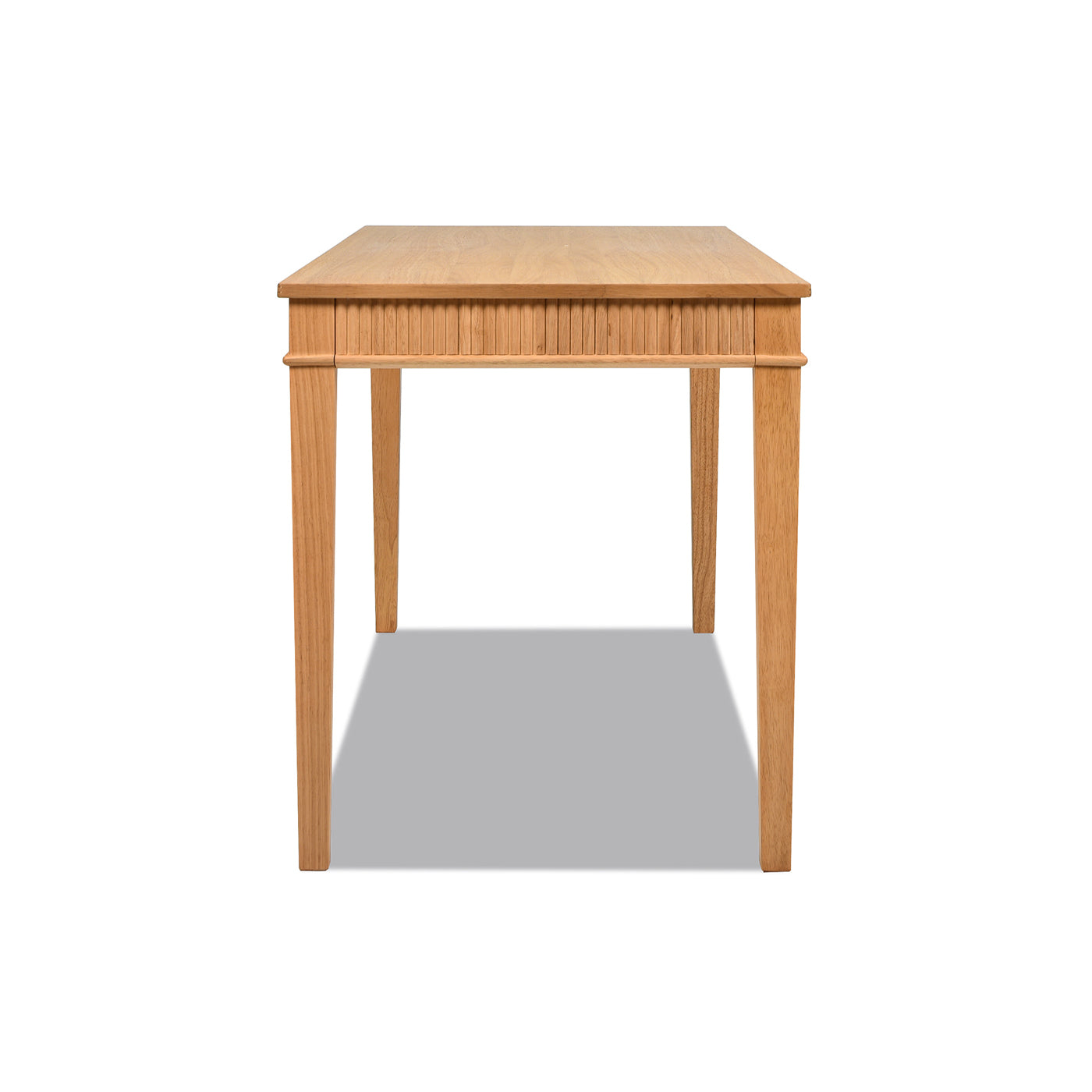 Light oak dining table with fluted apron and tapered legs