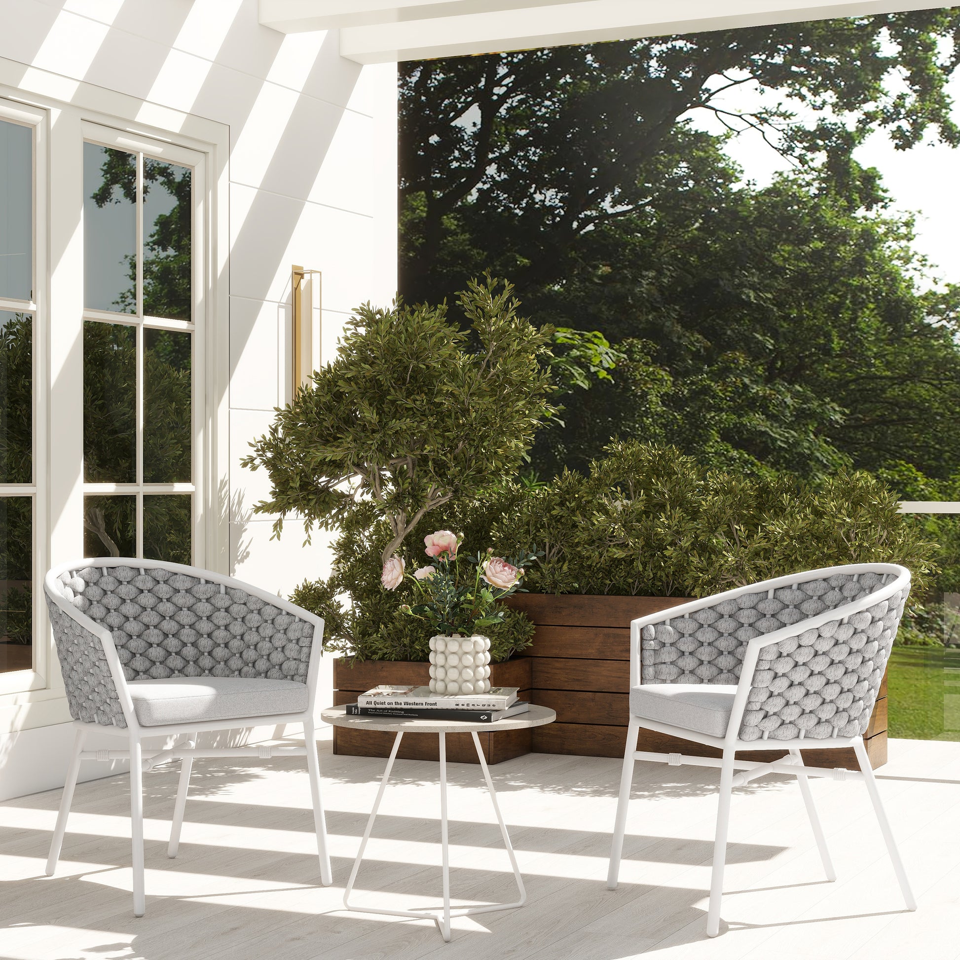 Modern outdoor patio chair with grey woven rope back and white frame