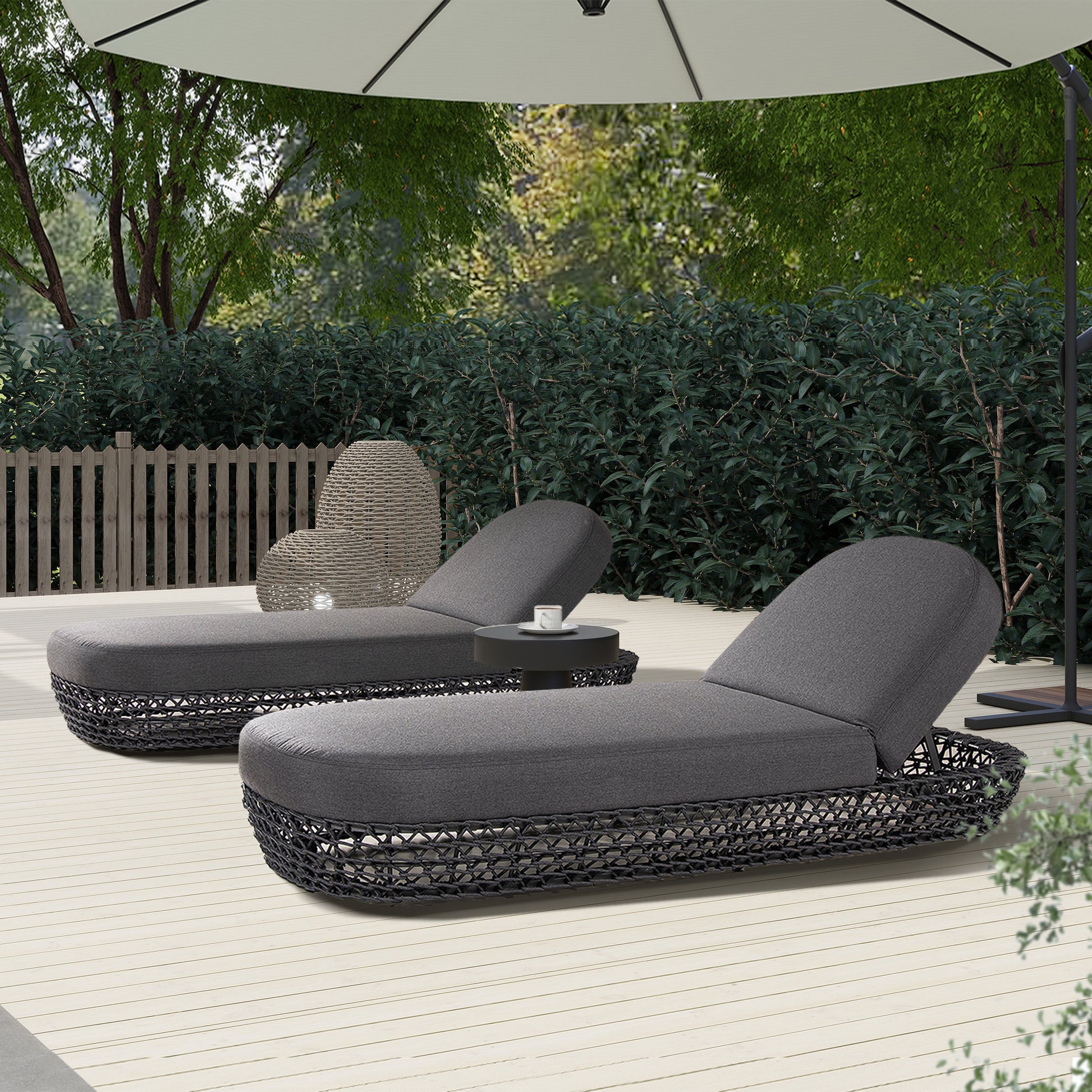 Dark gray outdoor chaise lounge with woven black base