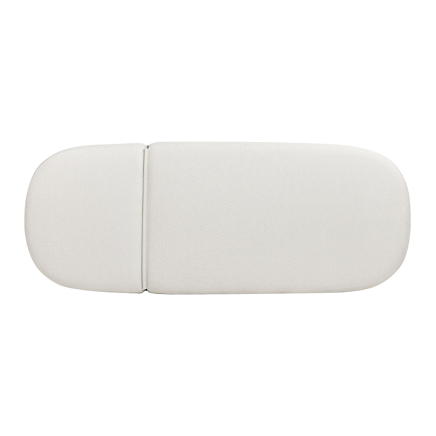 White modern chaise lounge with rounded ends upholstered in textured fabric for comfort