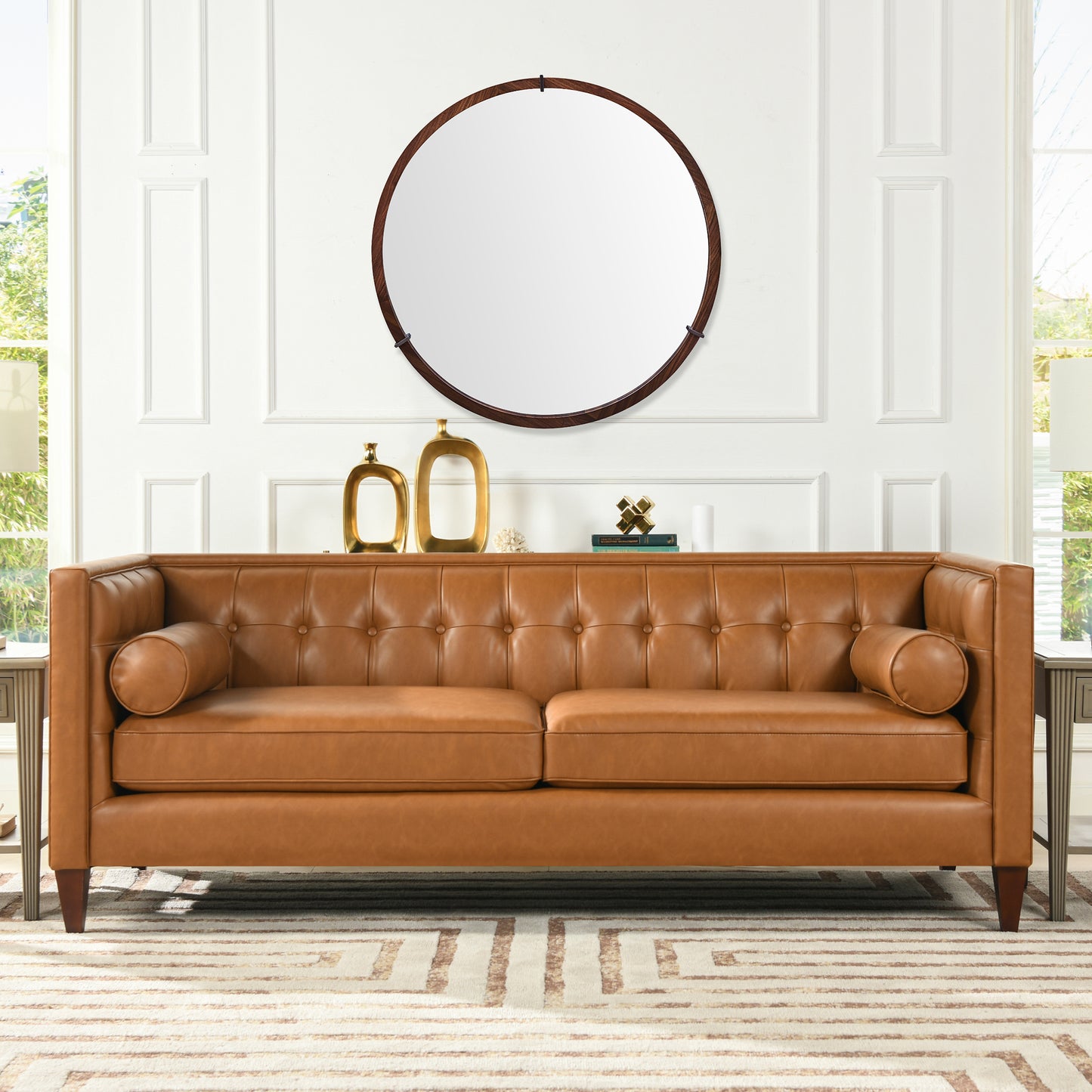 Tufted caramel leather sofa with bolster pillows perfect for a modern living room