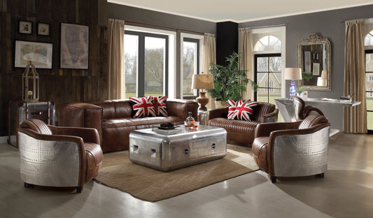 Brown leather aviator sofa with Union Jack accent pillows designed for living room