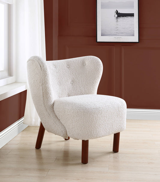 Cream teddy bear fabric accent chair with tufted back and dark wood legs