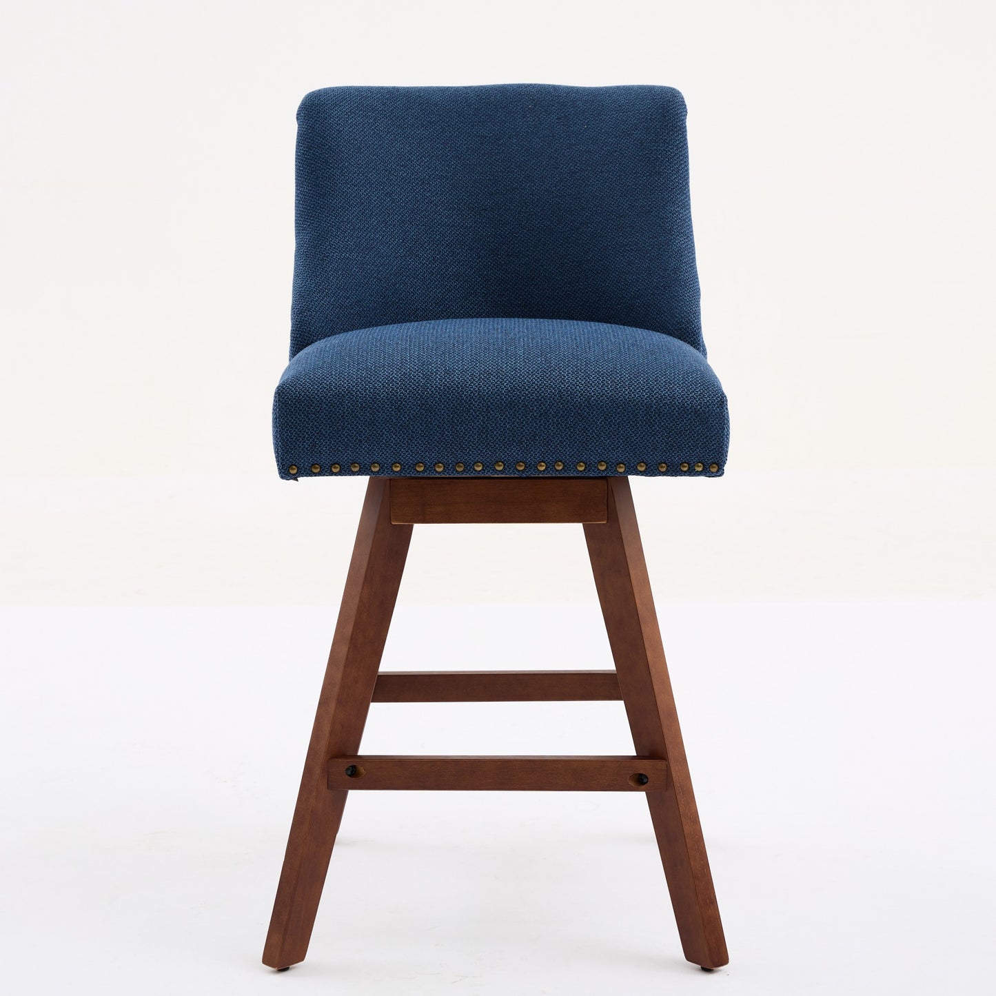 Blue upholstered swivel bar stool with wooden legs and brass nailhead trim