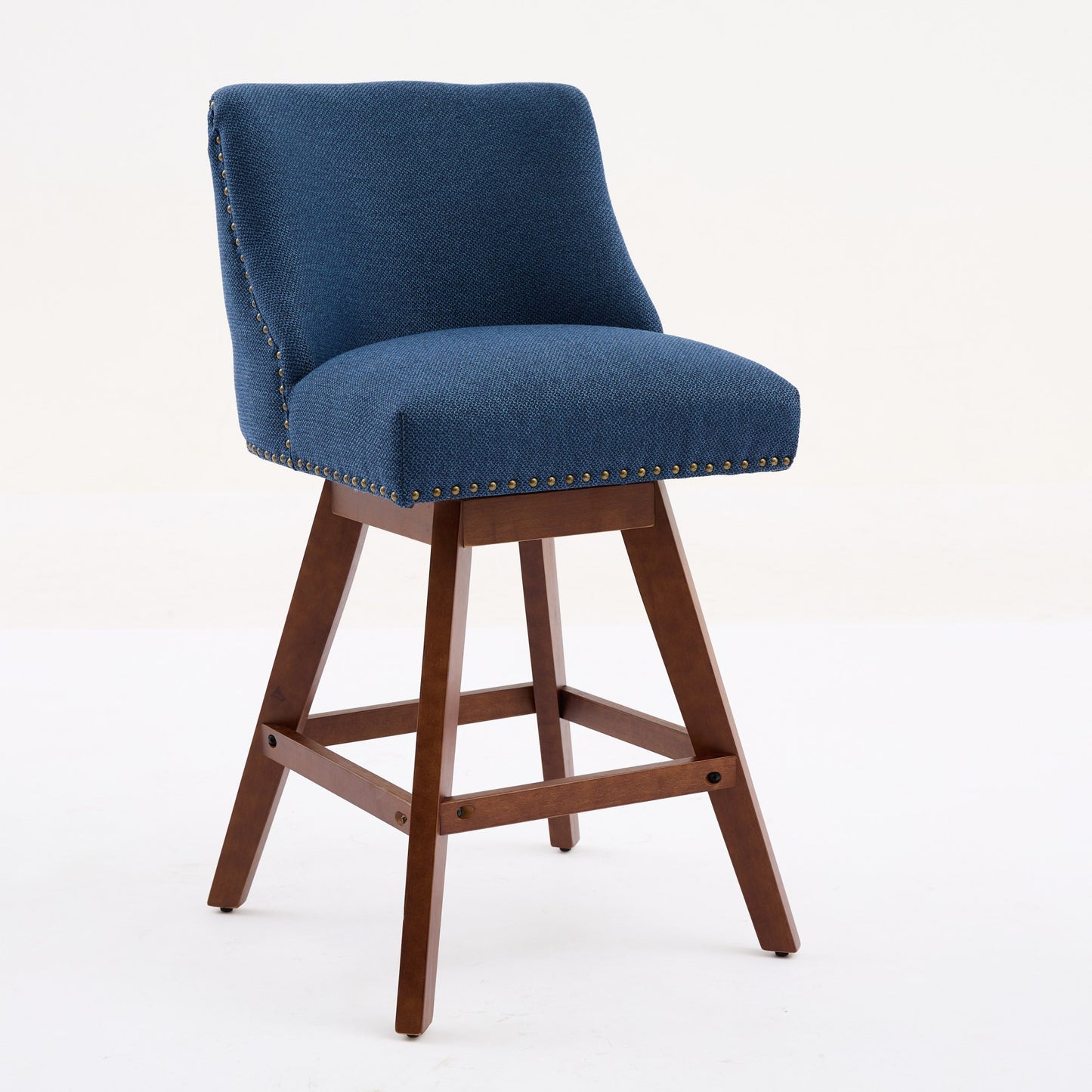 Swivel bar stool with navy blue textured fabric brass nailhead trim and a wooden base