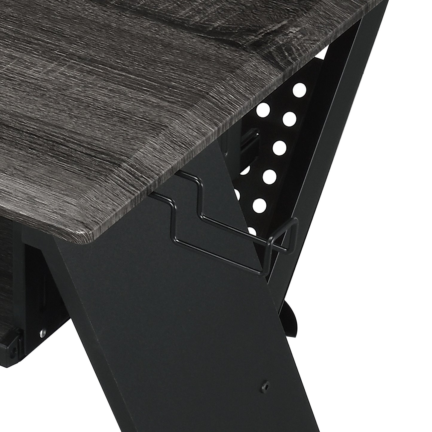 Dark grey wood grain desk surface with black metal support and cable management clips