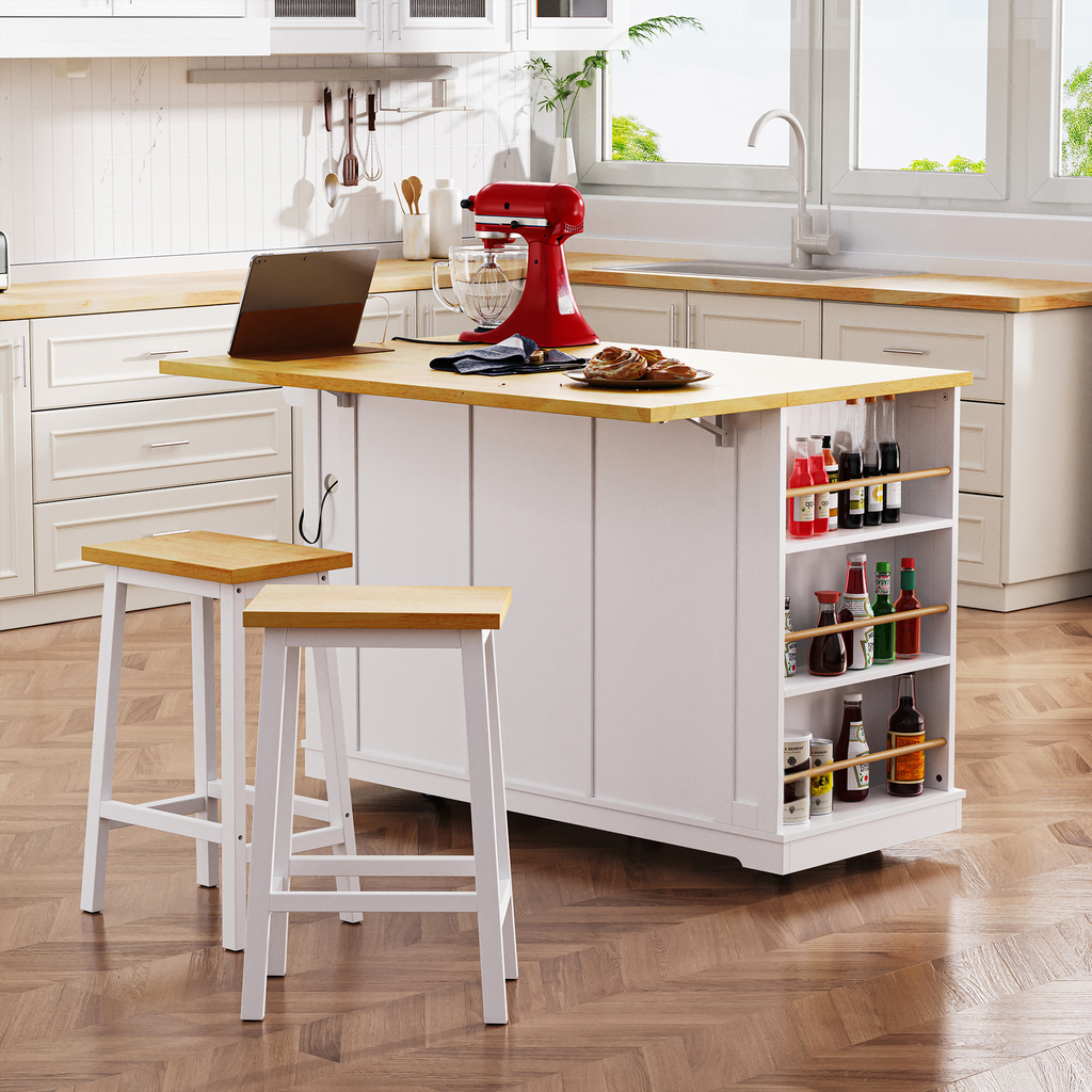 White kitchen island with butcher block top and builtin spice rack featuring two wooden bar stools