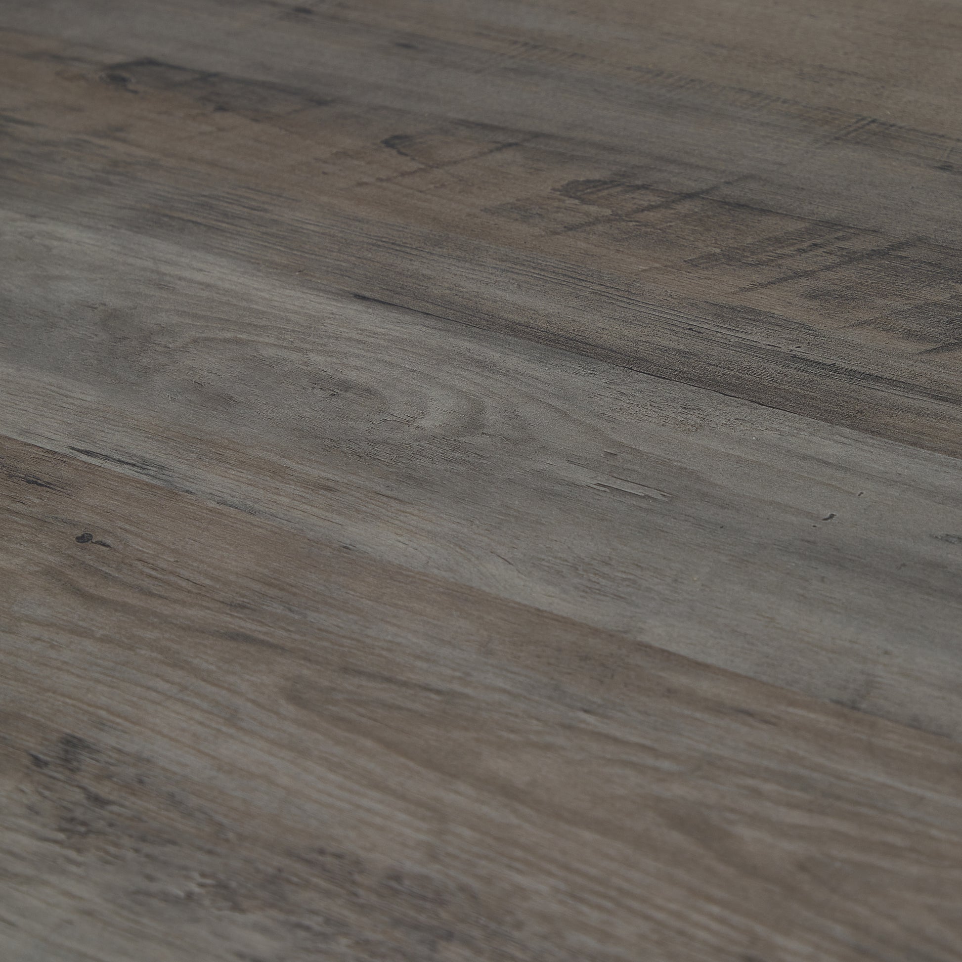 Rustic grey wood plank flooring with natural grain details