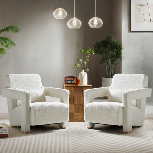White boucl armchair with modern block arms and wood accents