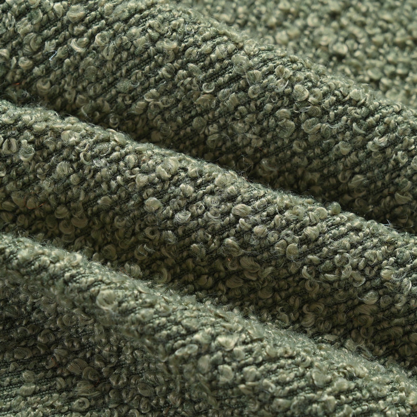 Textured olive green boucle fabric with looped yarn for upholstery