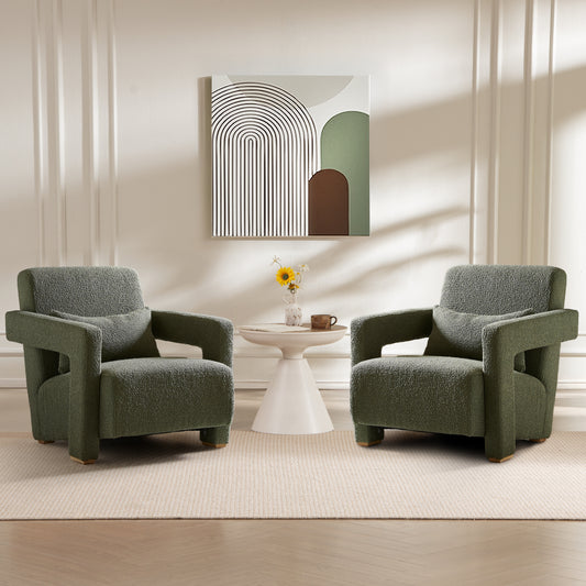 Plush green armchair with textured fabric and wooden legs