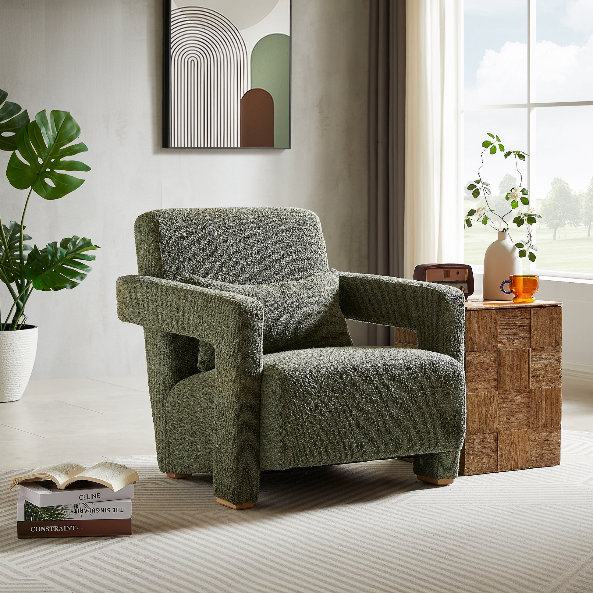 Cozy green boucl armchair with textured fabric featuring wide arms and a comfortable seat cushion for ultimate relaxation