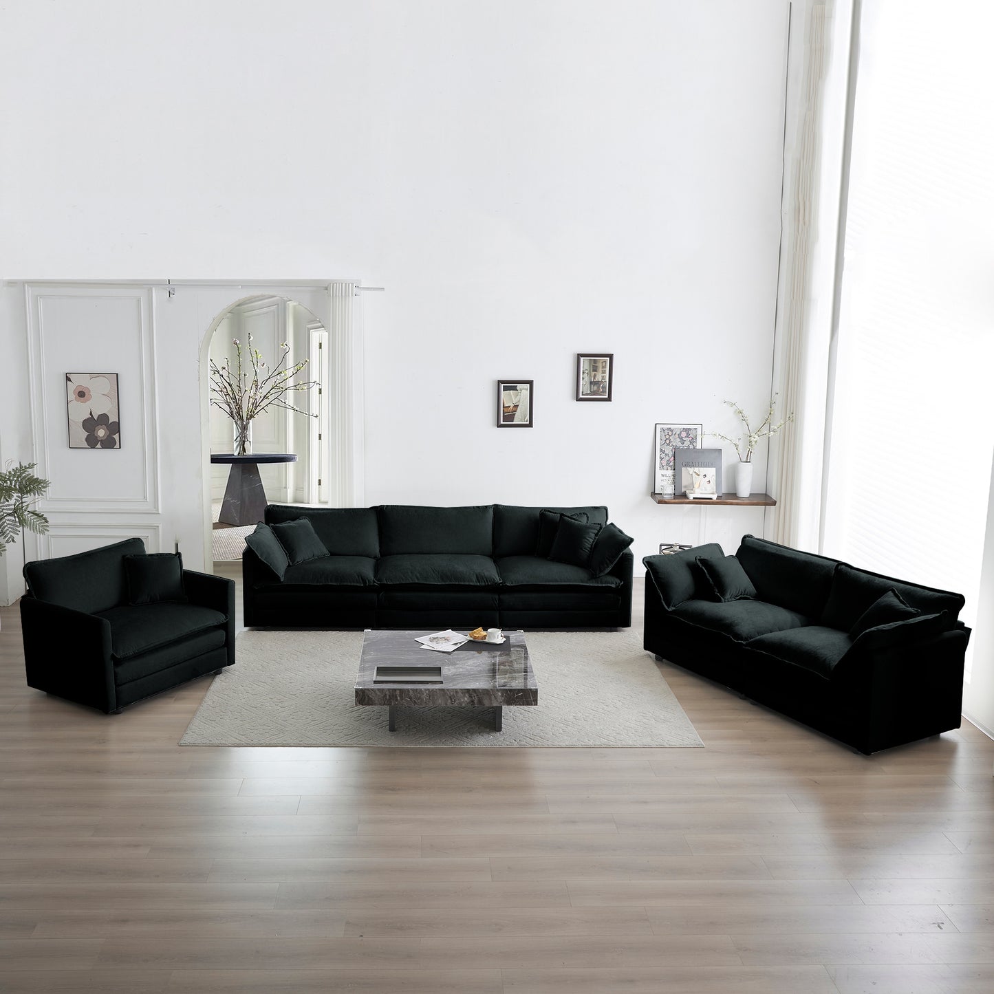 Plush black velvet sectional sofa with deep seats and accent pillows for modern living rooms