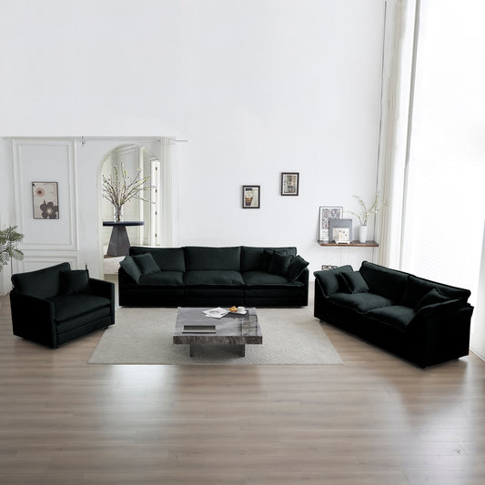 Plush black velvet sectional sofa with deep seats and accent pillows for modern living rooms