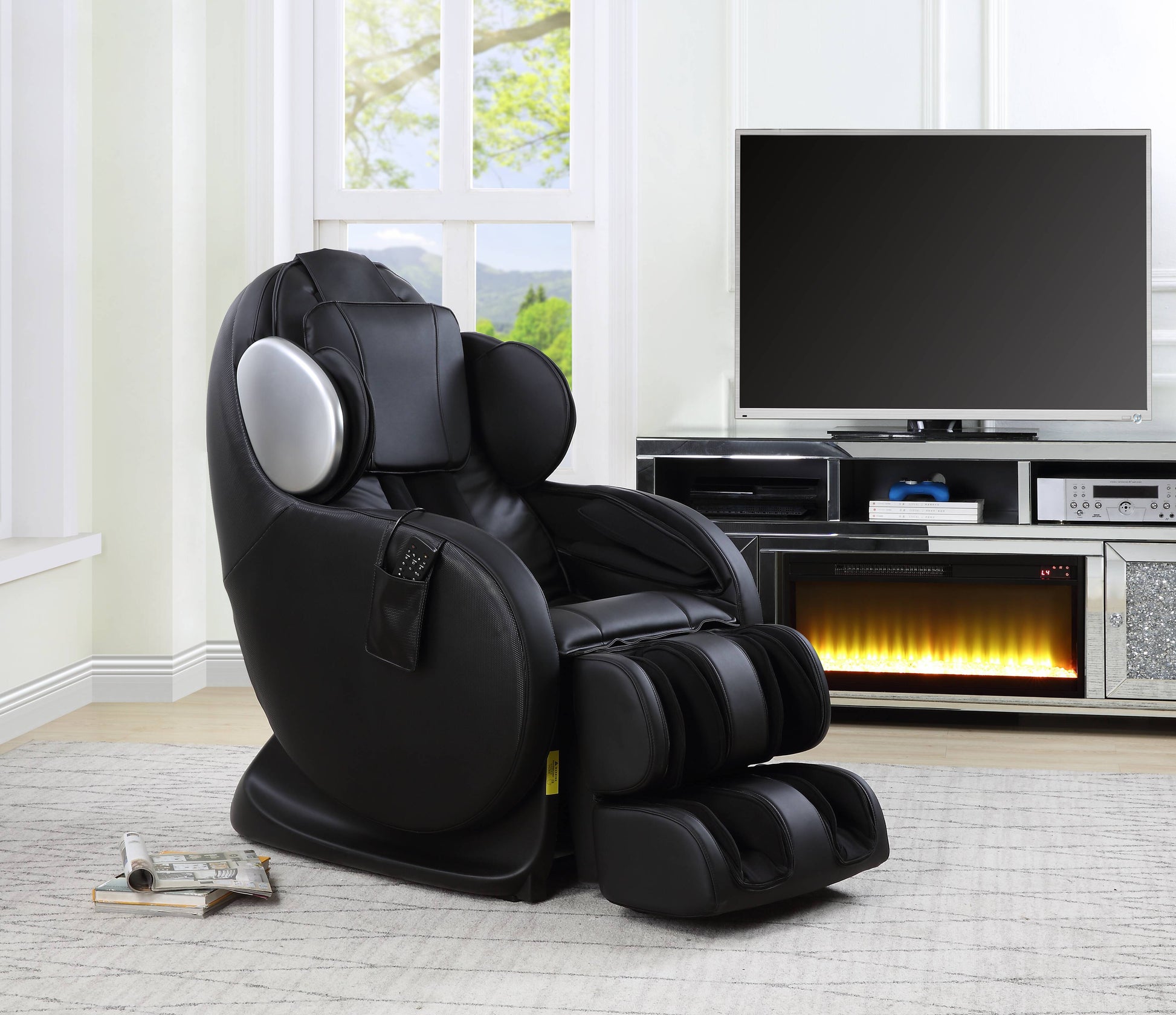 Black faux leather massage chair with plush cushioning and foot massager