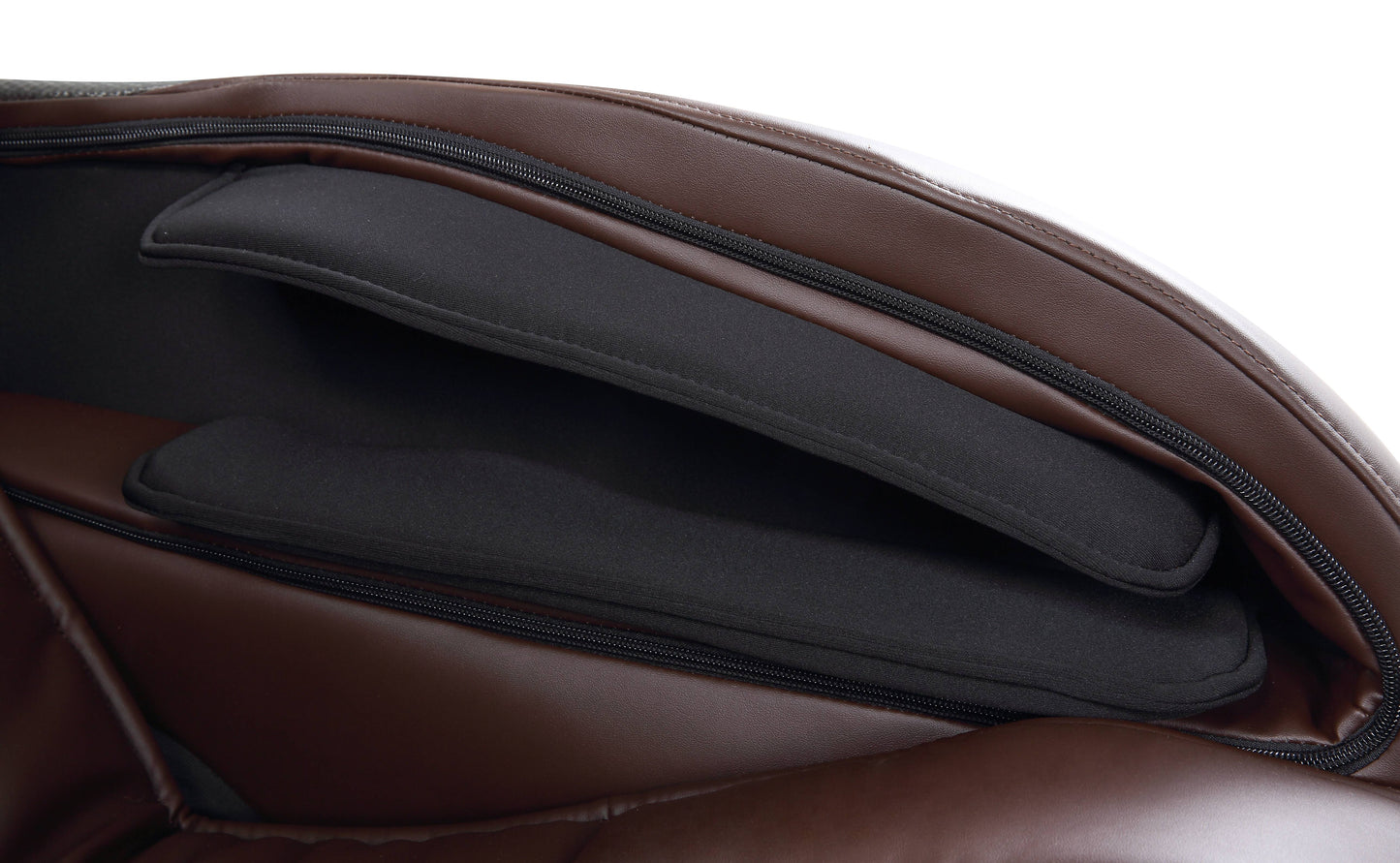 Brown leather massage chair interior with black padded headrest detail