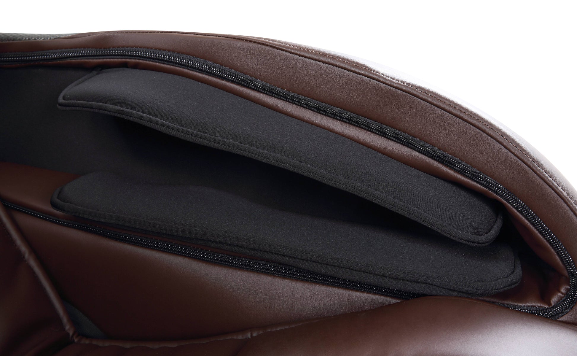 Brown leather massage chair interior with black padded headrest detail