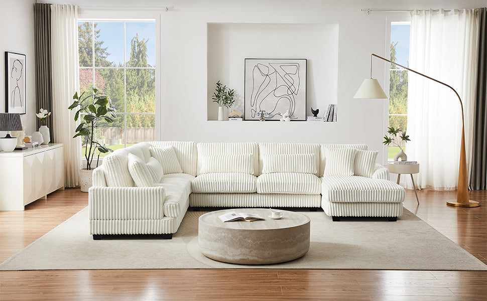 Plush ivory corduroy sectional sofa with deep seats and plush cushions perfect for modern living rooms