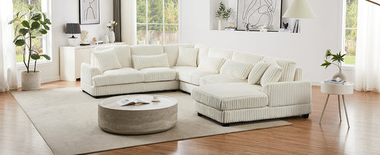 Plush cream corduroy sectional sofa with throw pillows perfect for a cozy living room