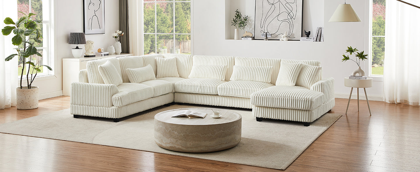White corduroy sectional sofa with plush pillows perfect for a cozy living room