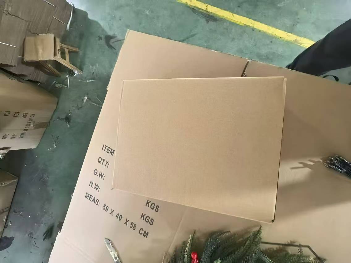 Brown cardboard box with shipping labels and measurements ready for wholesale delivery