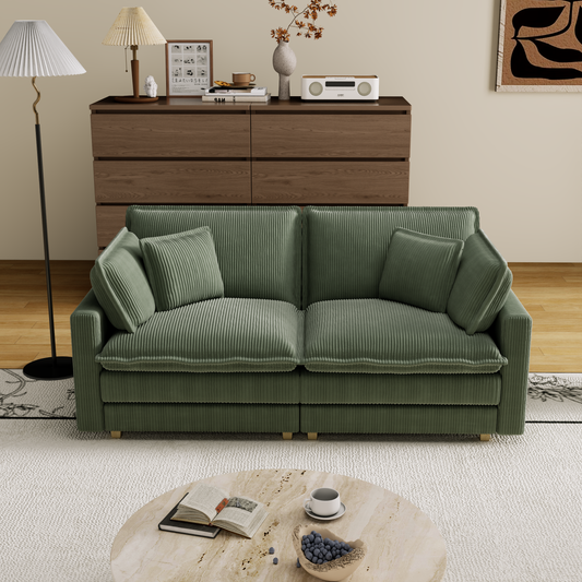 Sage green corduroy sofa with plush cushions perfect for a modern living room
